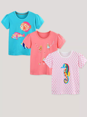 Kids cotton crew neck t-shirts with playful fish, fairy, and seahorse graphics.