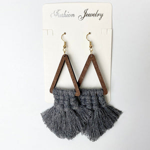 Macrame triangle tassel earrings in dark gray with wooden frames.