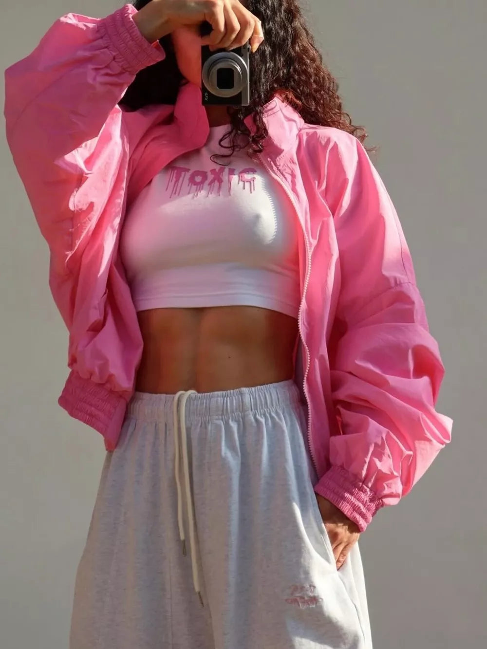 100% polyester Care instructions: Machine wash cold bomber jacket in Fuchsia Pink with oversized silhouette