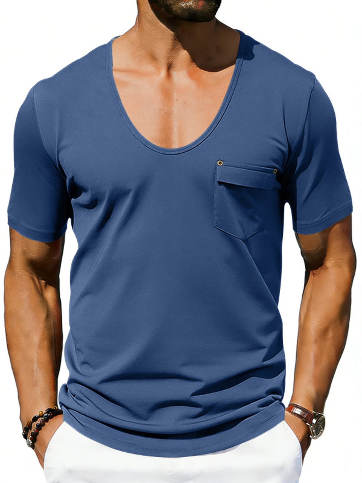 Blue cotton blend tee with scoop neck, short sleeves, and chest pocket detail.