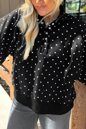 black sweatshirt with hip-length and snap