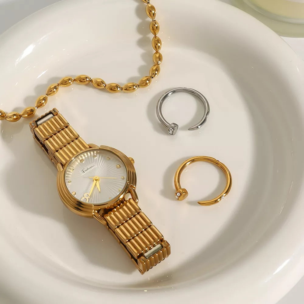 ring in gold featuring open design and fitted fit
