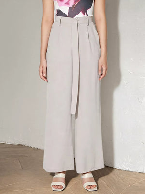 Light gray high-waisted maternity pants with wide legs and a self-tie belt.