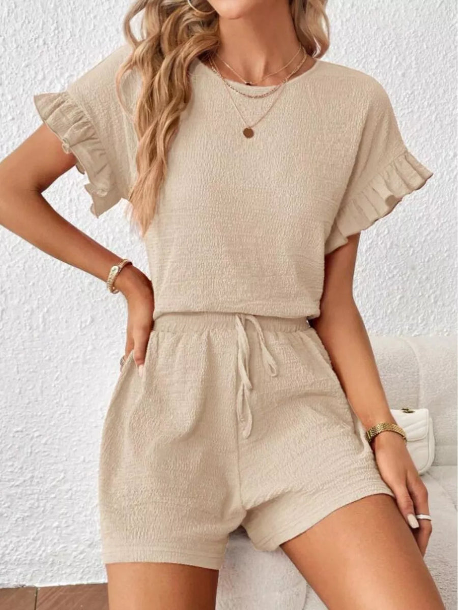 Beige frill sleeve tee and drawstring shorts set with textured fabric.