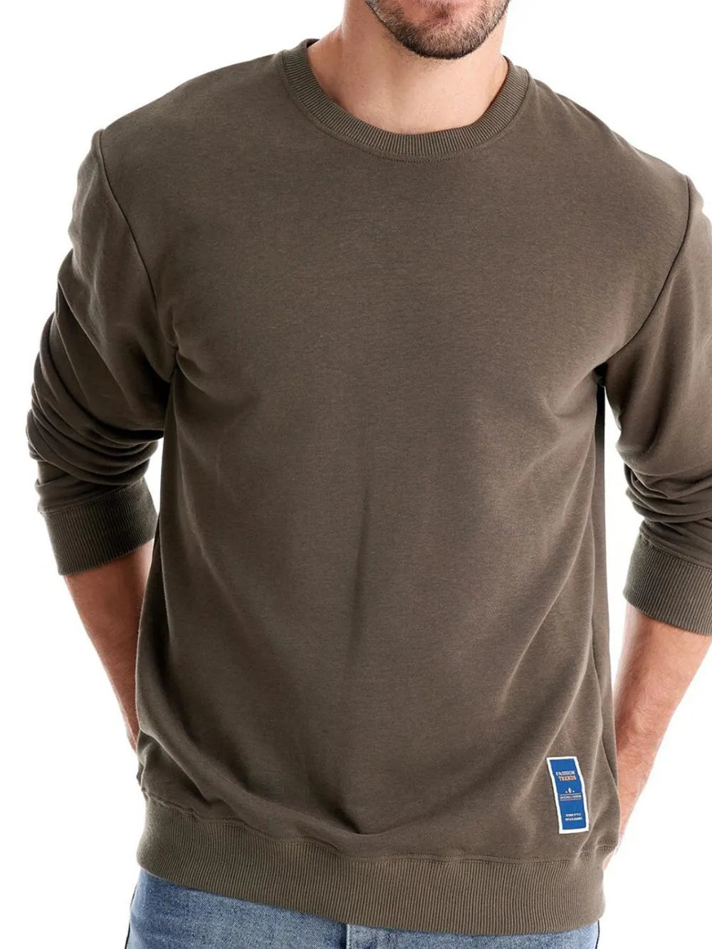 Army green crewneck sweatshirt with ribbed cuffs and hem, featuring a subtle patch detail.