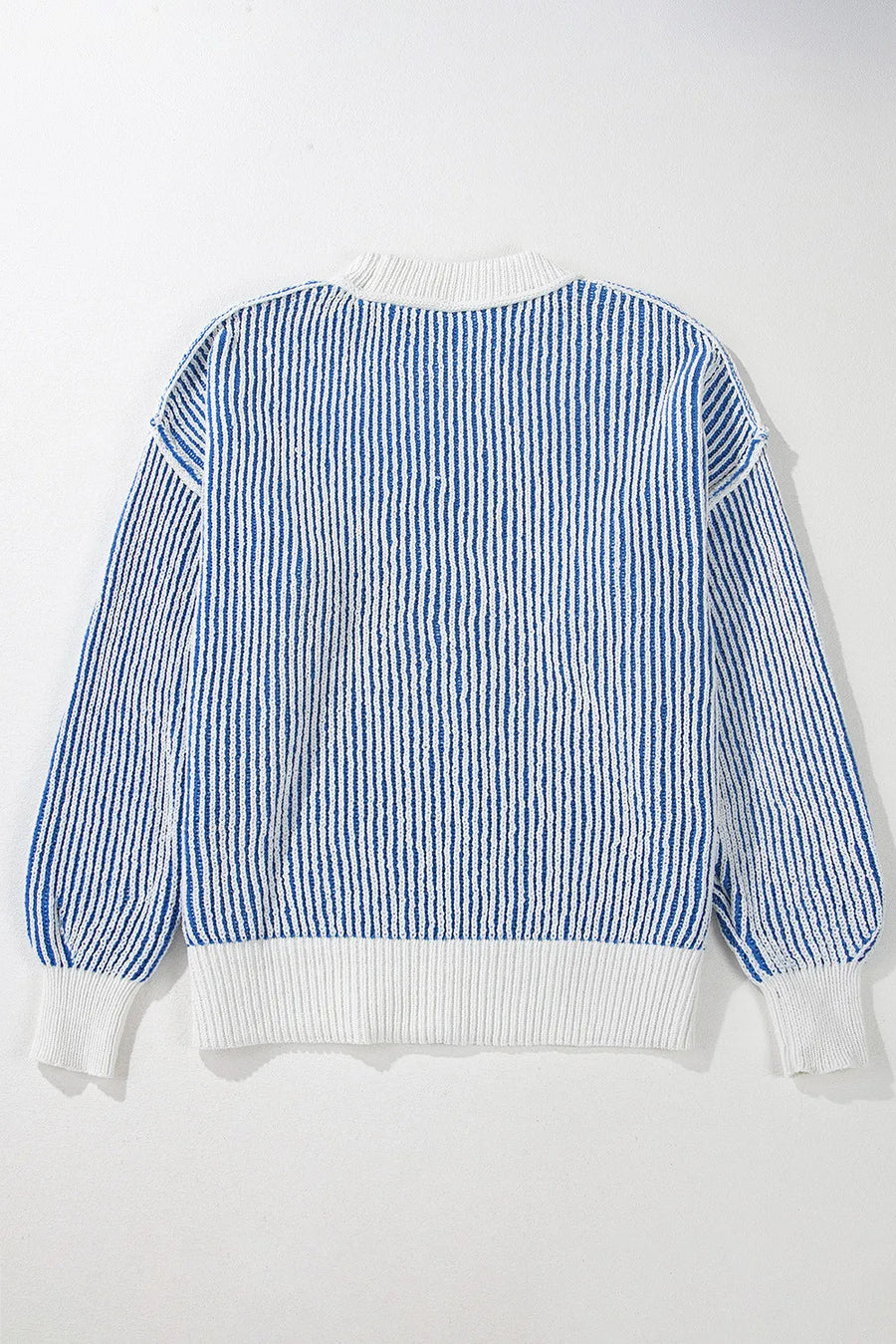 Light blue and white striped drop-shoulder knit sweater with ribbed cuffs and hem