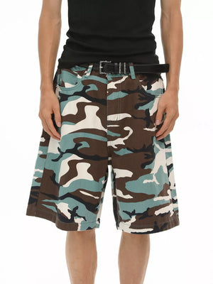 Men's camo denim shorts in brown, blue, and white with a relaxed fit.
