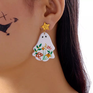 earrings in white featuring dangle and irregular fit