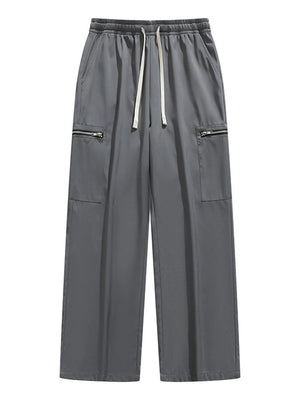 Dark gray wide-leg cargo pants with drawstring and zippered pockets.