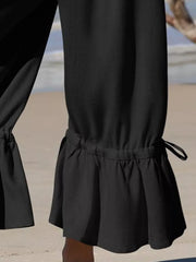 wide-leg pants in Brown with tied and cropped