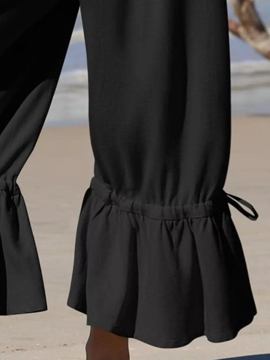 wide-leg pants in Brown with tied and cropped