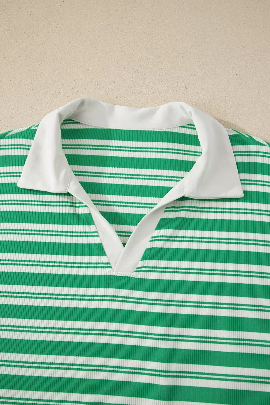 Green and white striped midi dress with collared V-neck and white trim