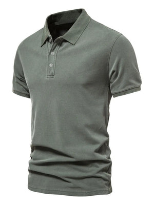 Sage textured polo shirt with short sleeves and buttoned placket.