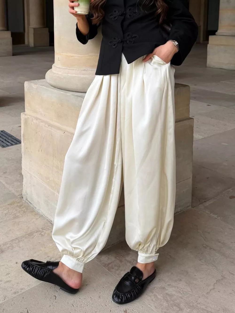 wide-leg pants in ivory featuring pocketed and loose fit