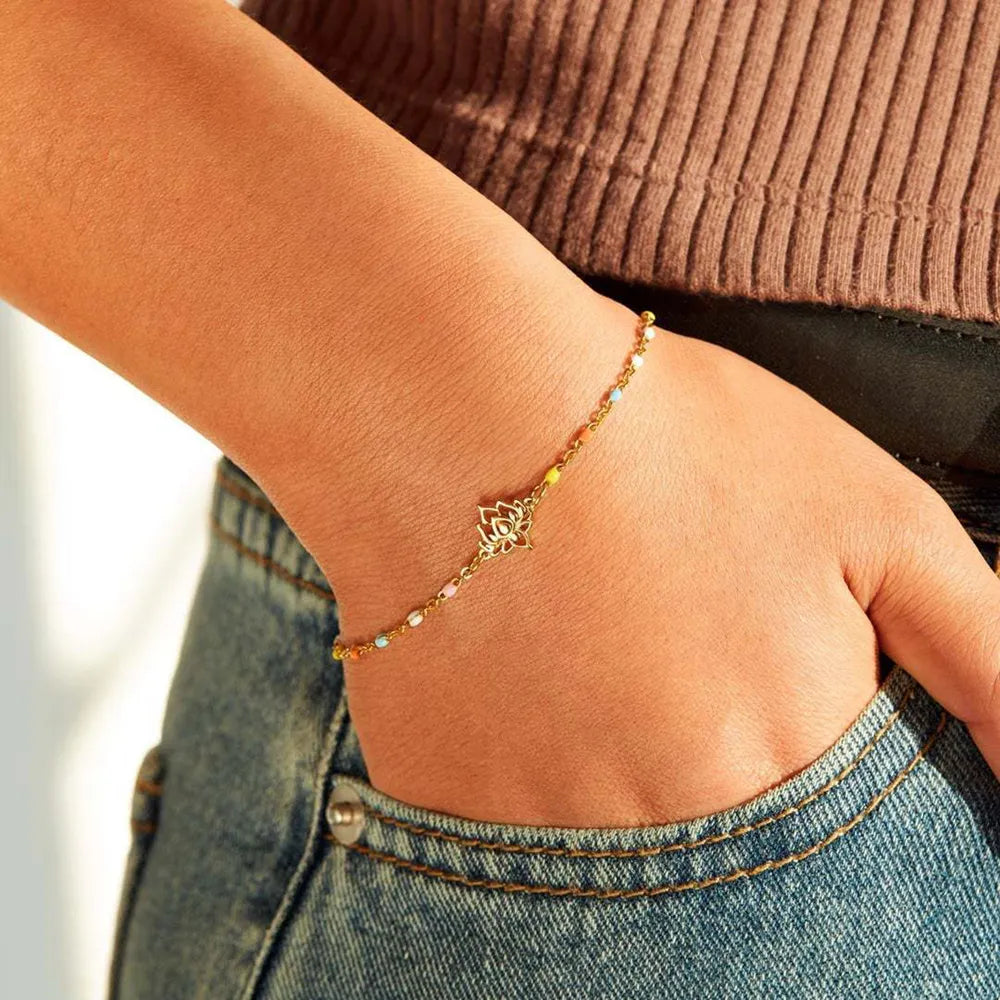 Gold enamel lotus bead bracelet with colorful accents
