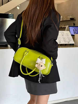 crossbody bag in lime green with adjustable strap and small