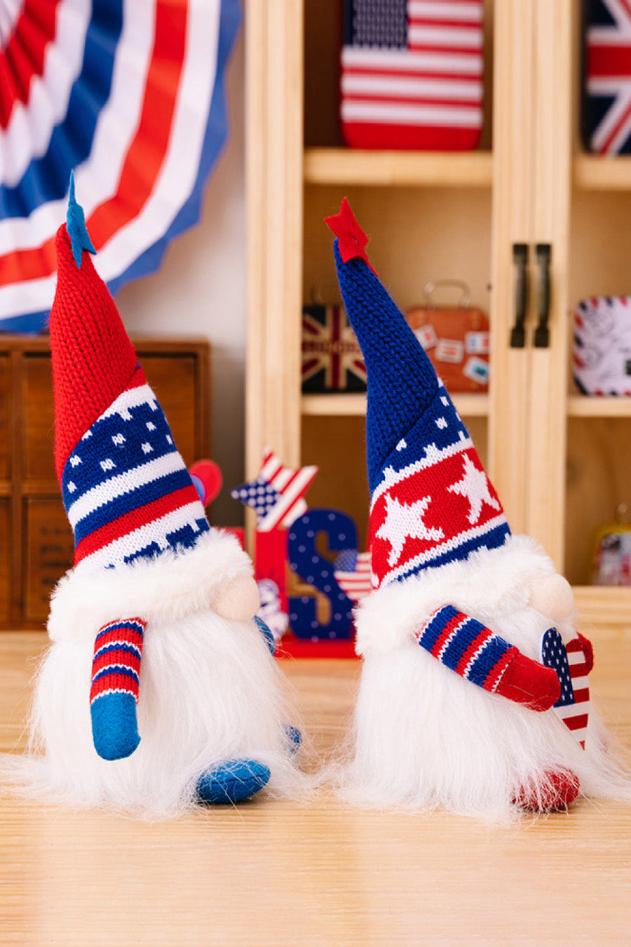 Patriotic knit gnomes in red and blue with white beards and star patterns.