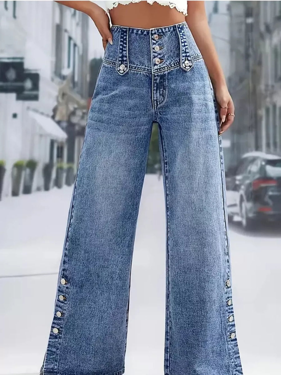 Wide-leg denim jeans with button accents on the fly and down the side seams.