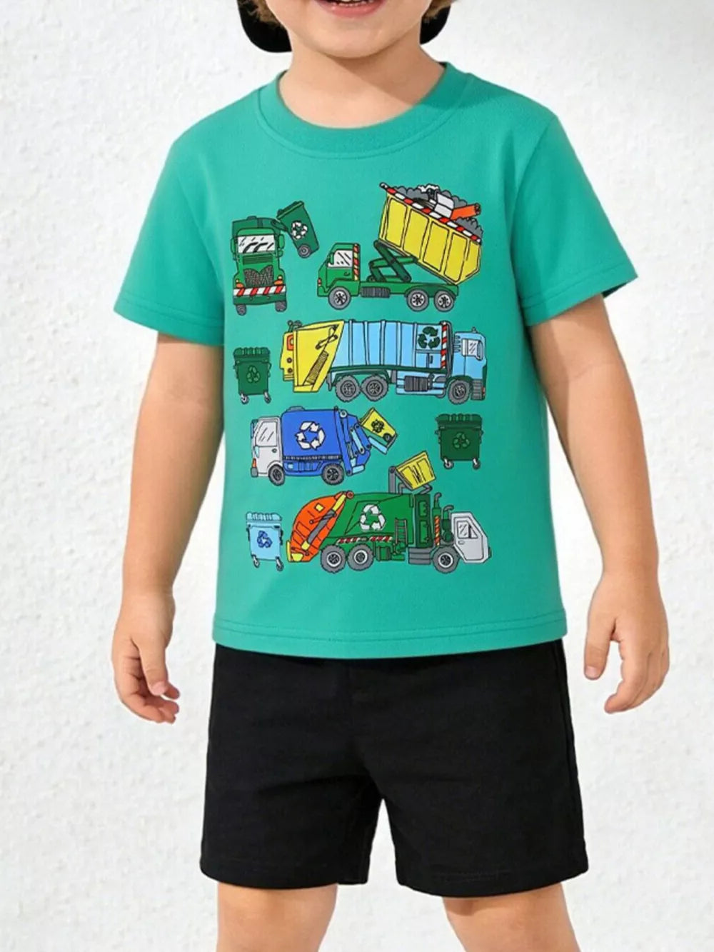 Green cotton t-shirt with playful cartoon garbage trucks and bins graphic print.