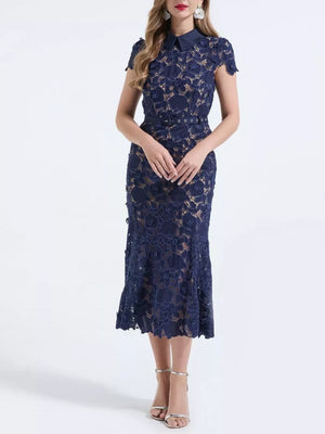 Dark blue lace midi dress with floral pattern, collar, short sleeves, and belt.