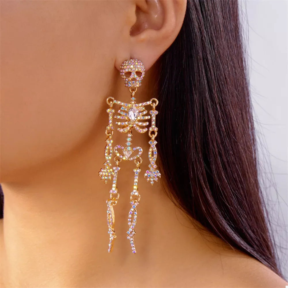 clear earrings featuring zircon embellishment and skeleton