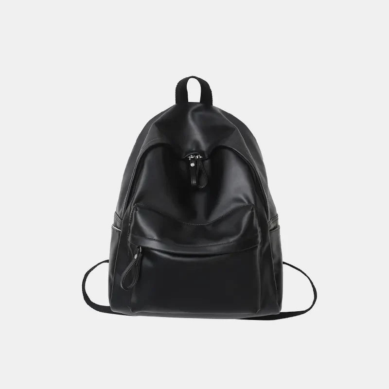Black leather backpack with front pocket and zipper closure