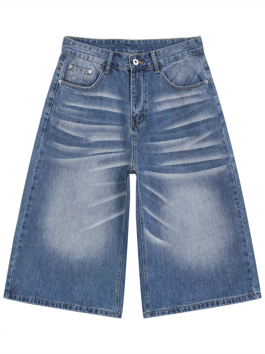 Relaxed fit cropped jeans in light blue denim with whiskering detail.