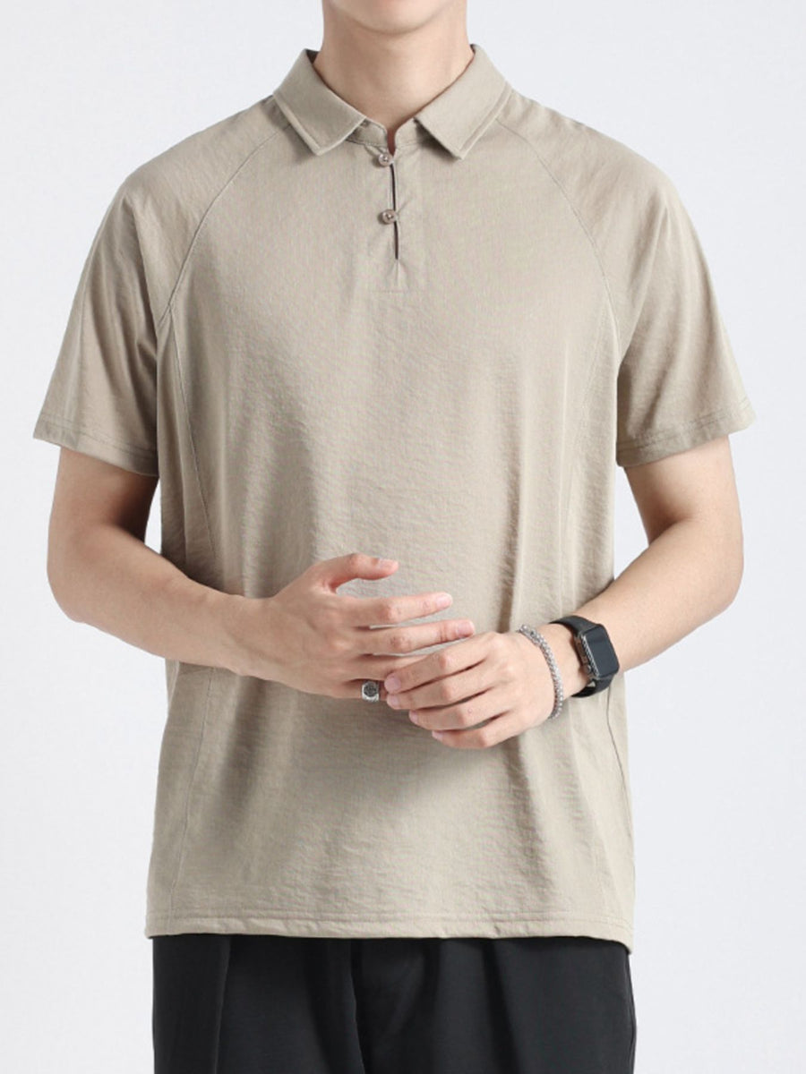 Khaki cotton blend polo shirt with two-button placket and short sleeves.