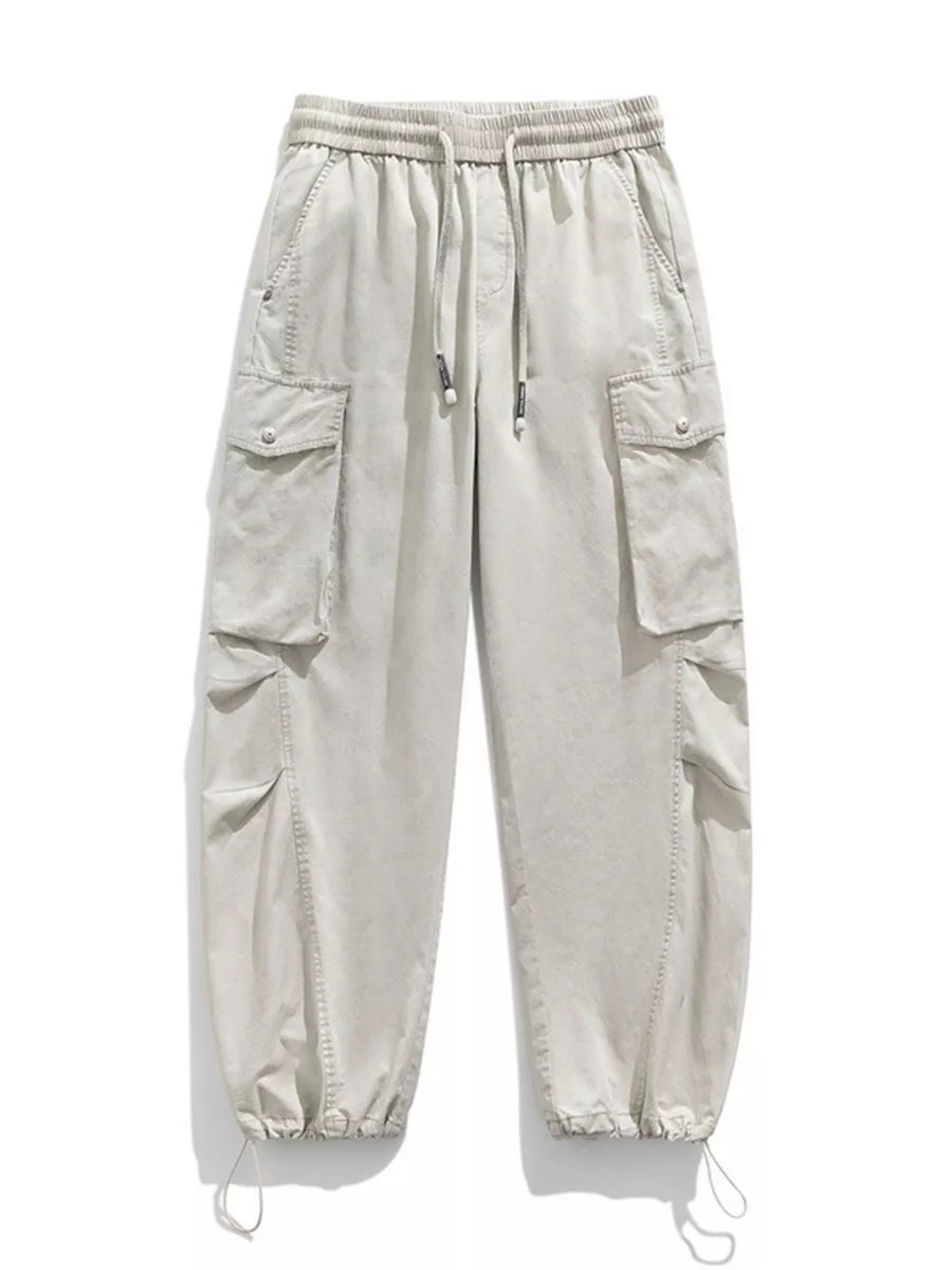 Men's Paris Gray drawstring cargo pants with multiple pockets and adjustable cuffs.