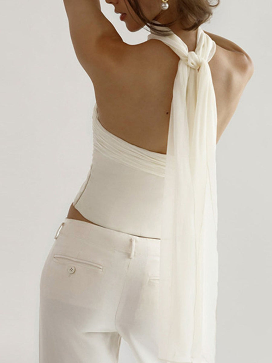 White ruched tube top with sheer scarf detail tied at the back, cropped length
