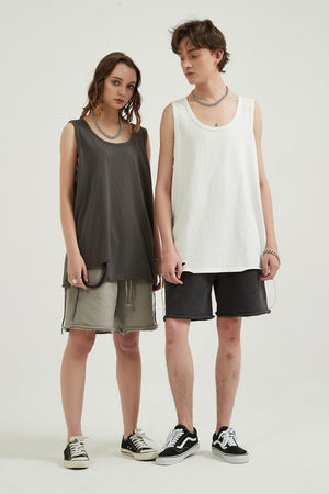 Dark grey sleeveless scoop neck tank top and light grey drawstring shorts
