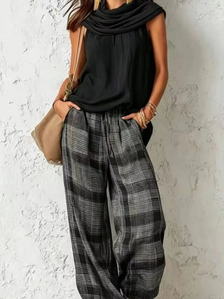 black two-piece set with plaid and cowl neck