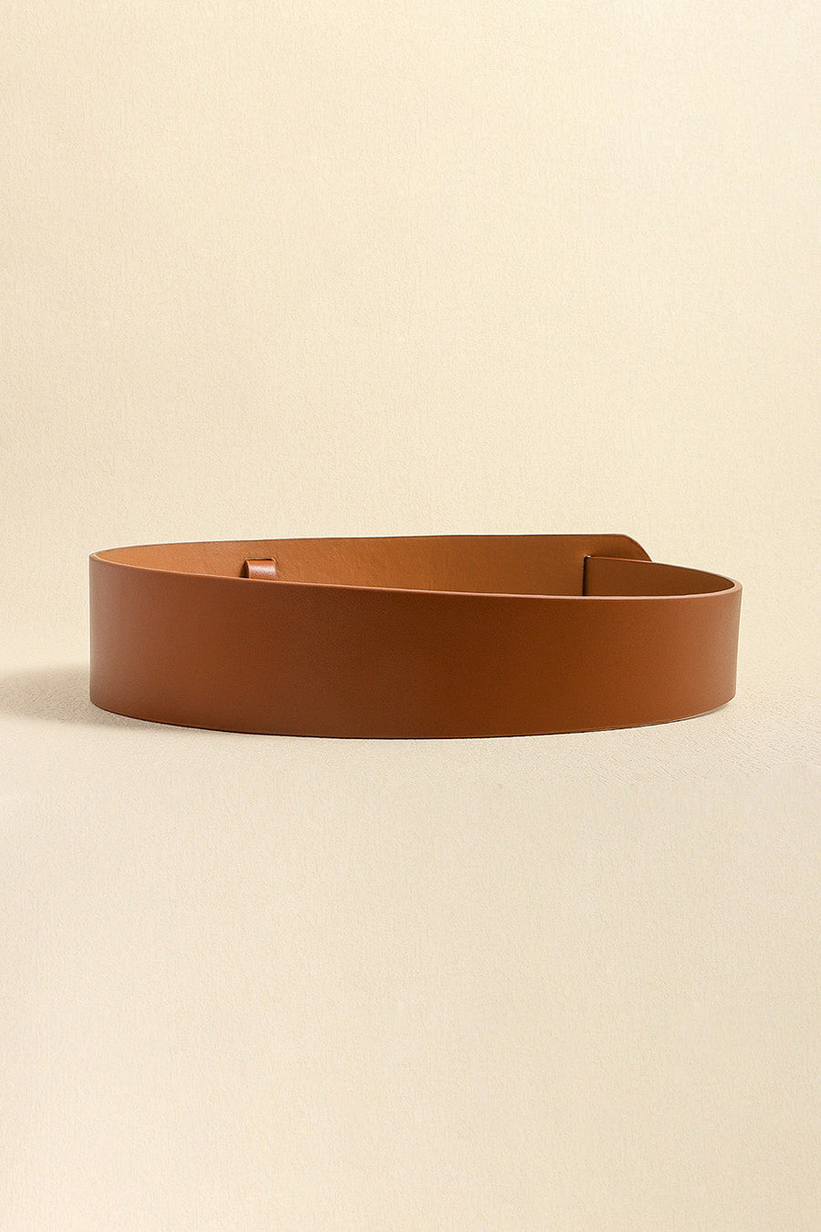 Sculpted leather waist belt in caramel with adjustable buckle detail