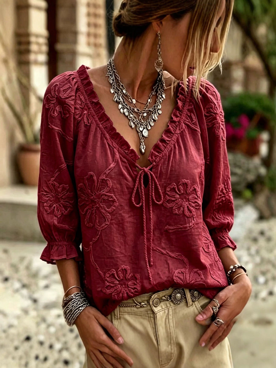 burgundy blouse with floral and v-neck