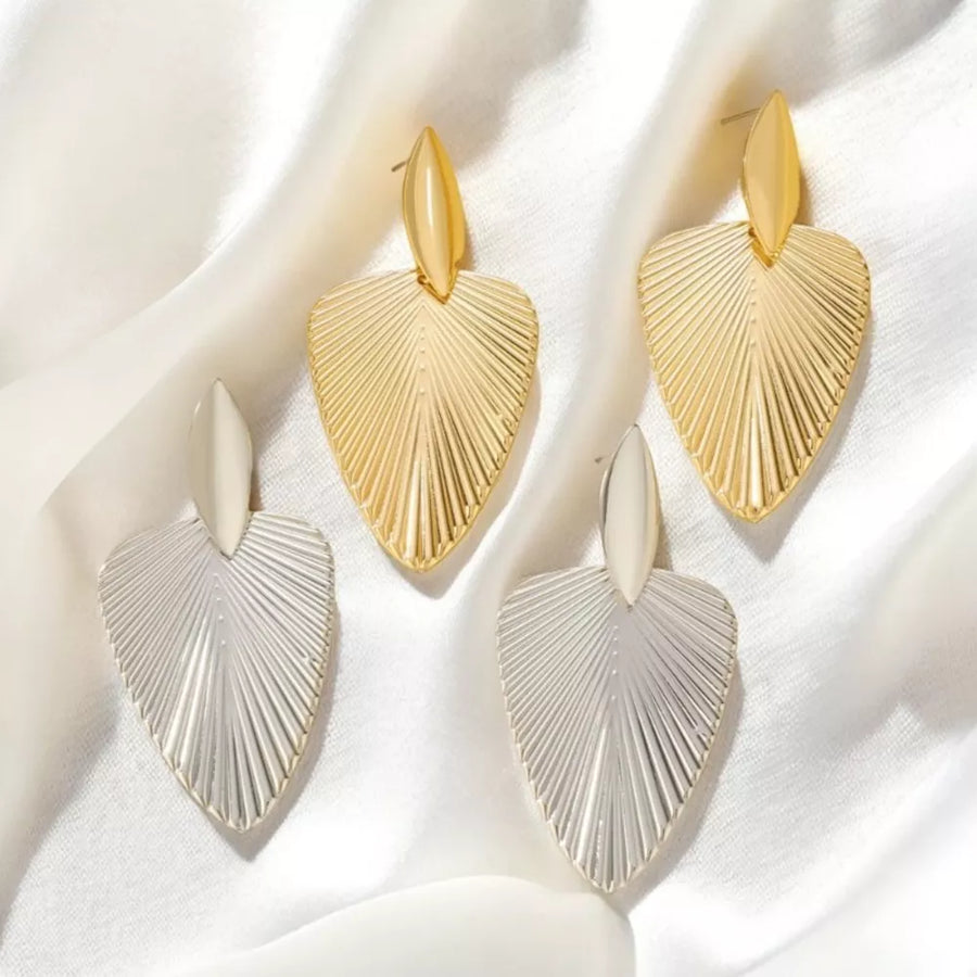 silver earrings featuring textured finish and textured