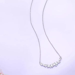 925 sterling silver,Zircon Care instructions: Avoid wearing during exercise, as necklace in clear with curved silhouette