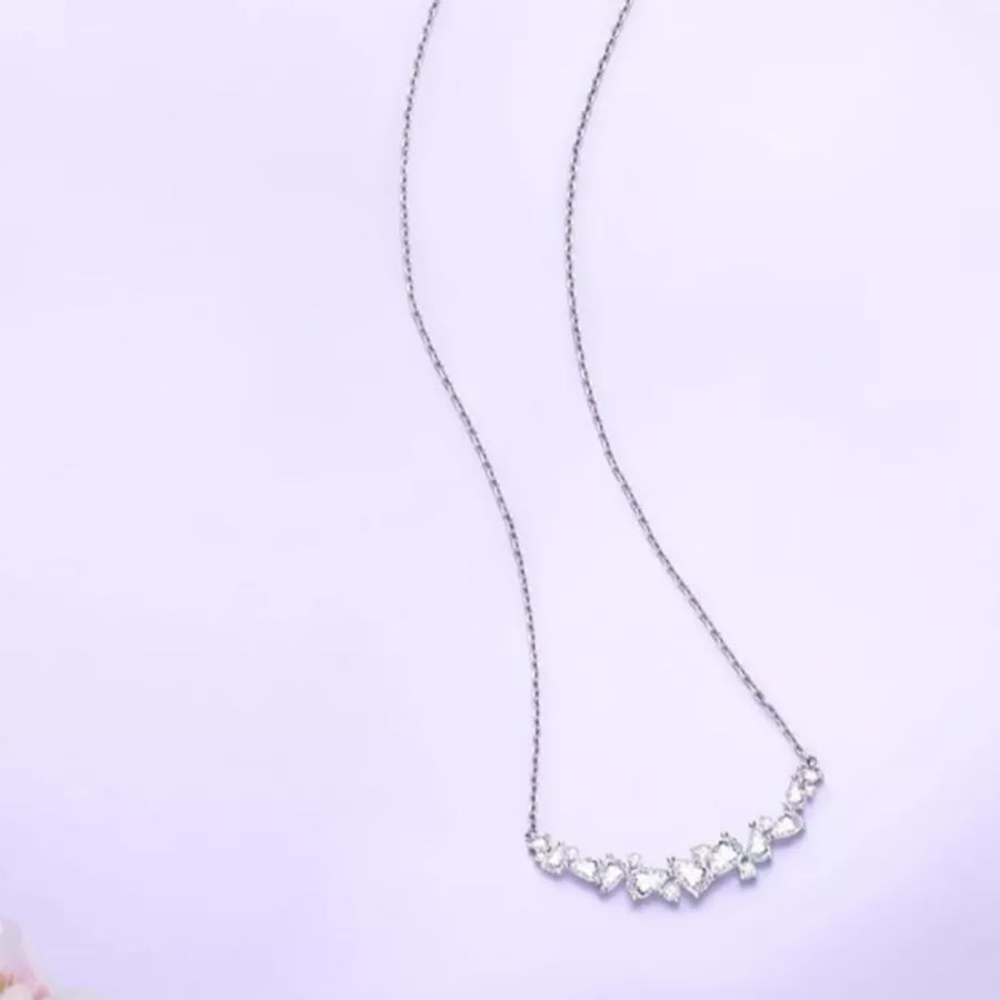 925 sterling silver,Zircon Care instructions: Avoid wearing during exercise, as necklace in clear with curved silhouette