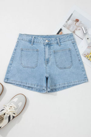 Light wash denim shorts with high rise and patch pockets.