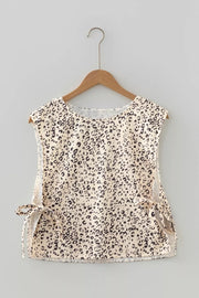 Knot detail leopard print tank top in cream and black with a scoop neck.