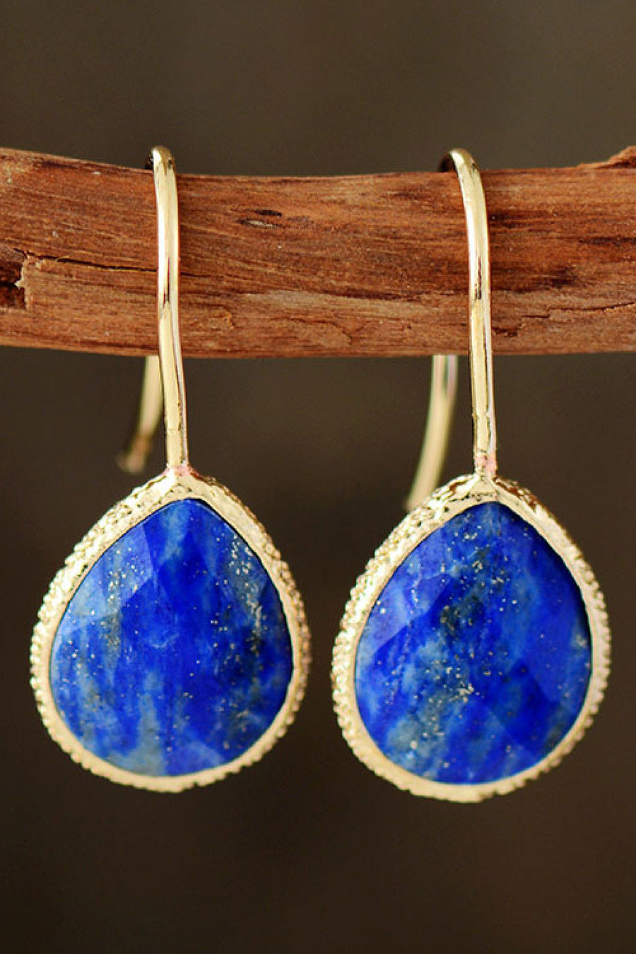 Textured royal blue gemstone drop earrings with copper accents.