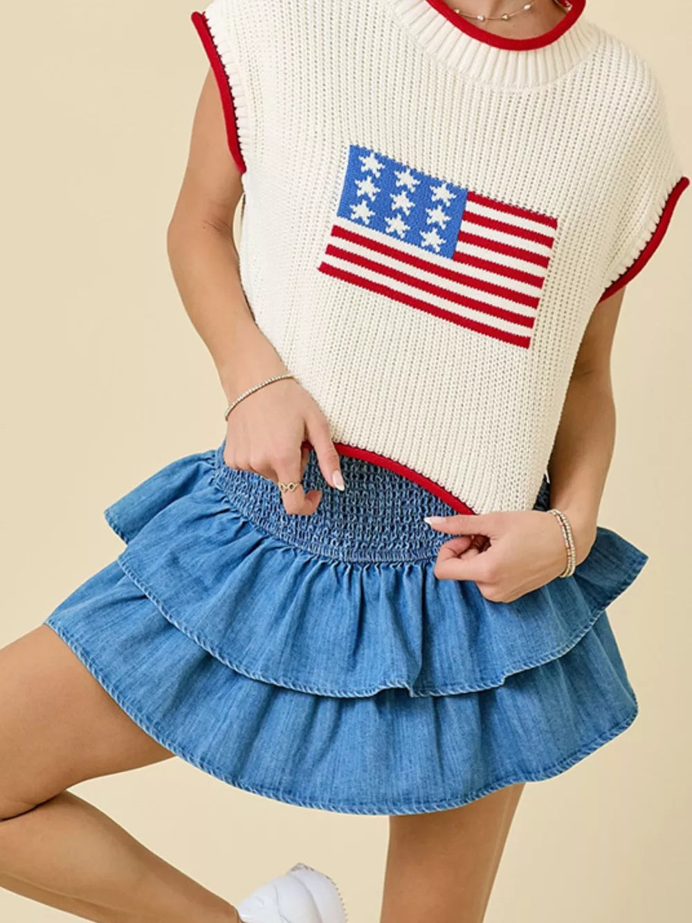 Flirty tiered ruffle denim skirt in light blue with smocked waist
