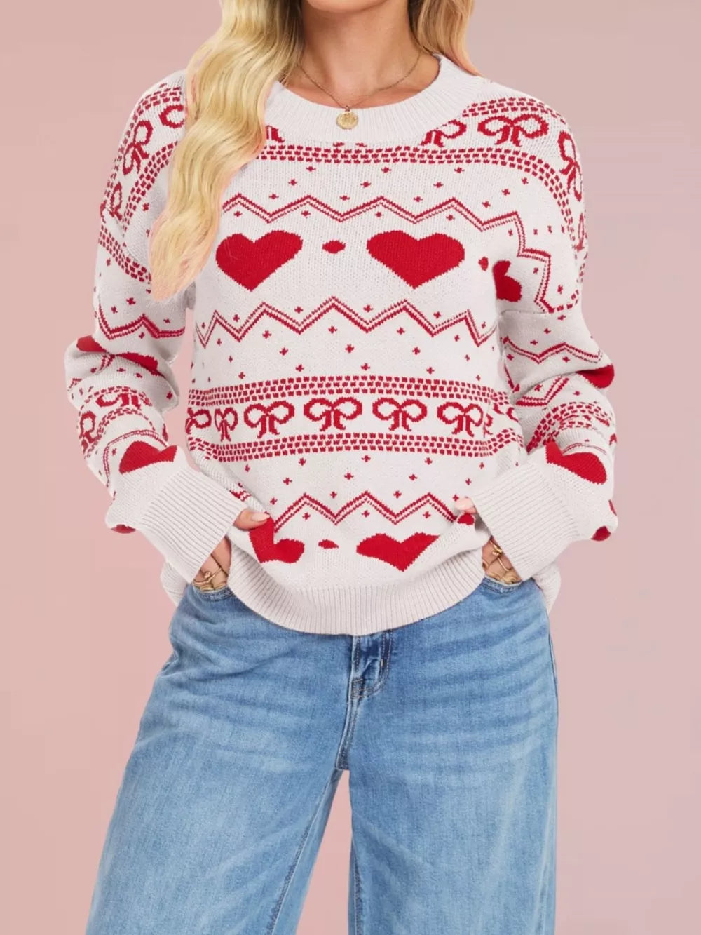 pullover sweater featuring fair isle with hearts and bows in Rose Red with 100% polyester Care instructions: Machine wash