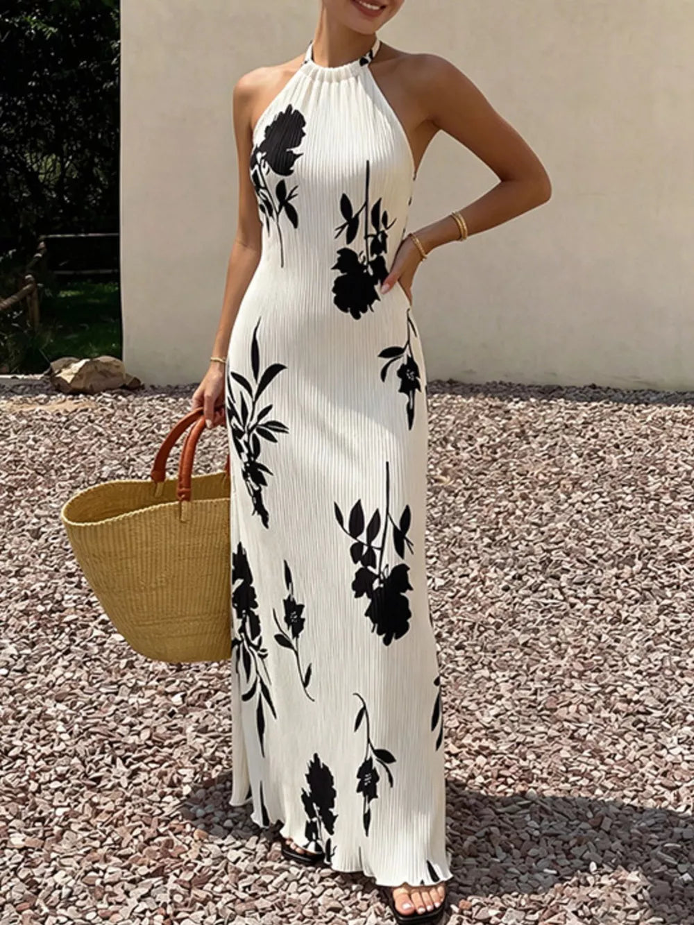 Ivory floral print halter neck maxi dress with button details and a-line cut
