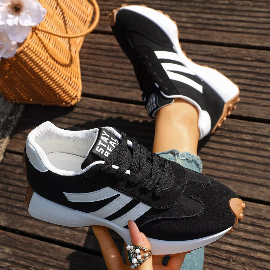 White sneakers with lace-up closure and not applicable