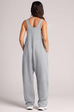 Relaxed fit gray jumpsuit with oversized pockets and scoop neckline.