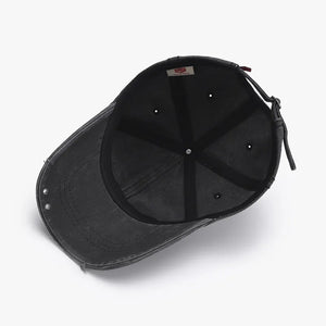 Black cotton baseball cap with distressed details and adjustable strap