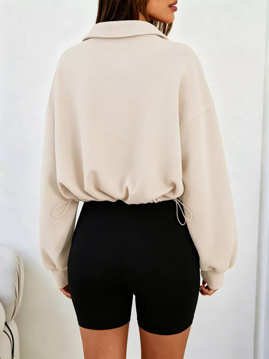 65% polyester, 30% viscose, 5% elastane Care instructions: Machine wash cold sweatshirt in Apricot with relaxed silhouette