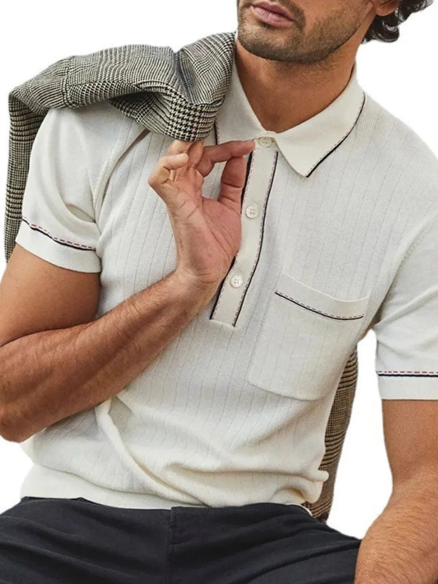 Ivory ribbed knit polo shirt with contrast piping and chest pocket.