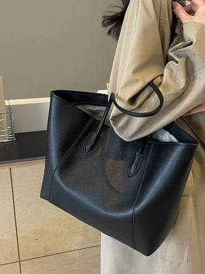 Chic structured black pu leather tote bag with clean silhouette and top handles.