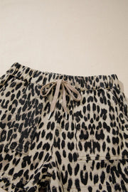 Denim shorts with leopard print and a lace-up drawstring waist.